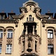Dom pod Gutenbergiem, ul. Piotrkowska 86 - posąg wynalazcy druku, Jana Gutenberga.